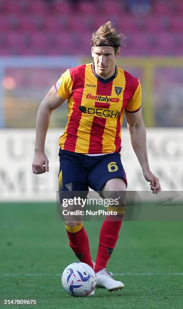 Federico Baschirotto of US Lecce is playing during the Serie A TIM match between US Lecce and Empoli FC in Lecce, Italy, on April 13, 2024.