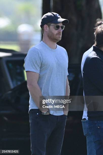 Prince Harry is seen at a polo event with a film crew on April 13, 2024 in Wellington, Florida.