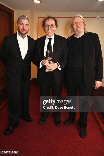 Jamie Lloyd, Don Black and Sir Christopher Hampton, winners of the Best Musical Revival award for "Sunset Boulevard", pose backstage during The...