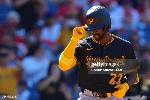 Andrew McCutchen of the Pittsburgh Pirates reacts after hitting his 300th career home run in the top of the ninth inning against the Philadelphia...