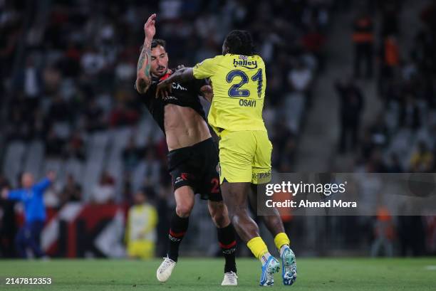 April 14: Bright Osayi-Samuel of Fenerbahce confronts with Federico Ceccherini during the Turkish Super League match between Fatih Karagumruk and...