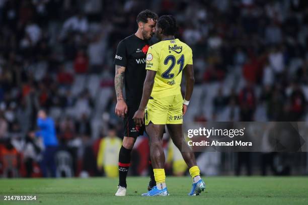 April 14: Bright Osayi-Samuel of Fenerbahce confronts with Federico Ceccherini during the Turkish Super League match between Fatih Karagumruk and...