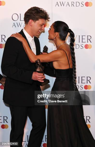 Tom Francis and Nicole Scherzinger pose in the winners room at The Olivier Awards 2024 at Royal Albert Hall on April 14, 2024 in London, England.