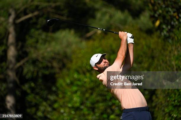 Scottie Scheffler hits his tee shot at the 11th hole during the final round of Masters Tournament at Augusta National Golf Club on April 14, 2024 in...