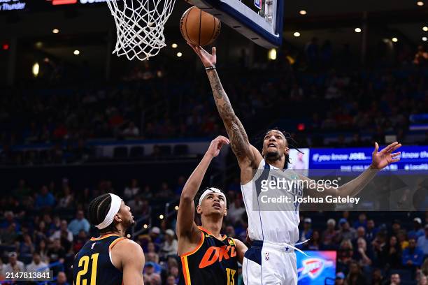Lawson of the Dallas Mavericks goes to the rim during the second half against the Oklahoma City Thunder at Paycom Center on April 14, 2024 in...