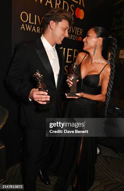 Tom Francis and Nicole Scherzinger, winners of Best Actor and Best Actress in a Musical for their performances in "Sunset Boulevard", pose backstage...