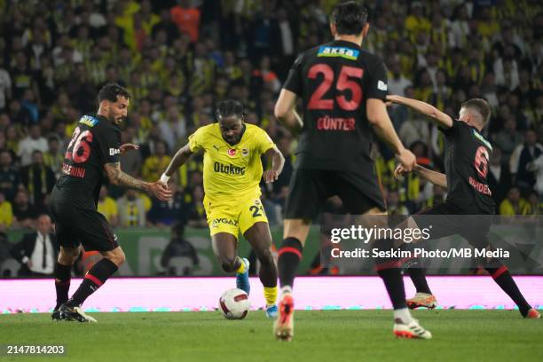 Federico Ceccherini of Fatih Karagumruk and Bright Osayi Samuel of Fenerbahce battle for the ball during the Turkish Super League match between Fatih...