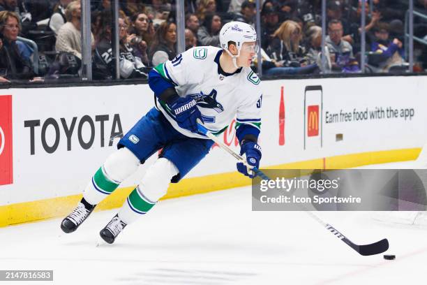 Vancouver Canucks defenseman Nikita Zadorov skates with the puck during the Vancouver Canucks game versus the Los Angeles Kings on April 6 at...