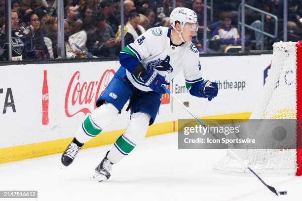 Vancouver Canucks defenseman Nikita Zadorov skates with the puck during the Vancouver Canucks game versus the Los Angeles Kings on April 6 at...