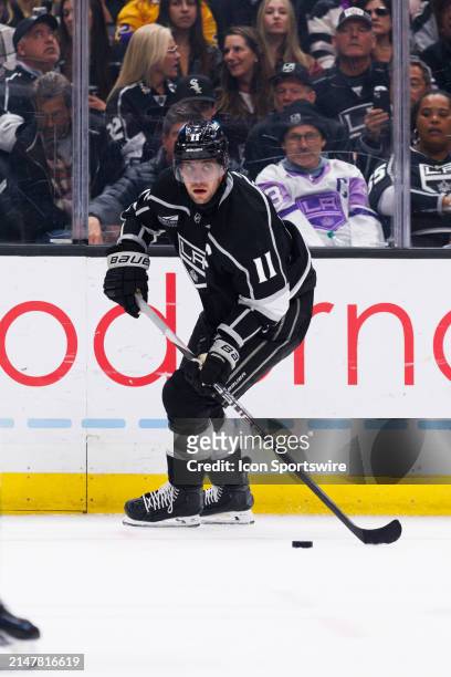 Los Angeles Kings center Anze Kopitar skates with the puck during the Vancouver Canucks game versus the Los Angeles Kings on April 6 at Crypto.com...