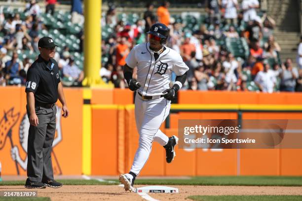 Detroit Tigers shortstop Javier Baez runs around third base after hitting a solo home run during the eighth inning of a regular season Major League...