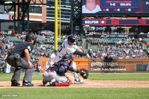 Detroit Tigers first baseman Spencer Torkelson hits a single to right field to score Detroit Tigers right fielder Mark Canha from third base for the...