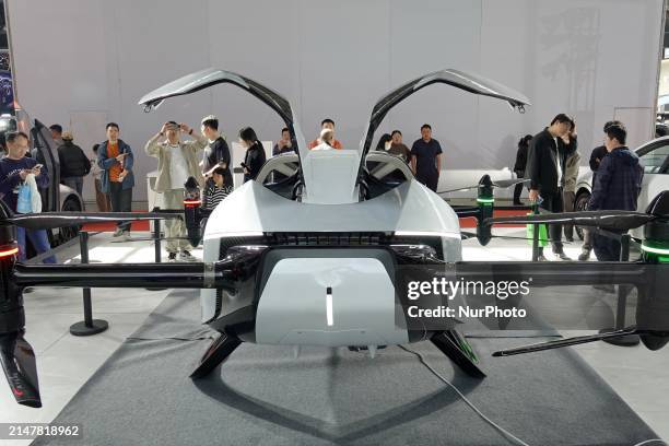 Visitors are viewing the XiaoPeng Hutian ''Traveler X2'' flying car at the Spring Auto Show in Yantai, China, on April 14, 2024. The application for...