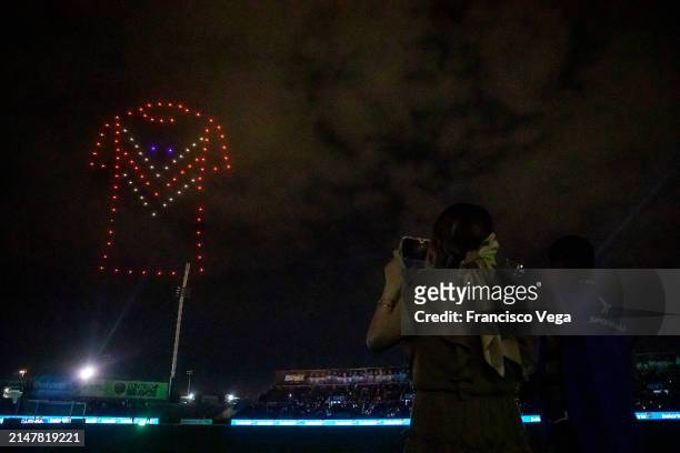 Couple watches the fireworks during the halftime show during the 15th round match between FC Juarez and Tijuana as part of the Torneo Clausura 2024...