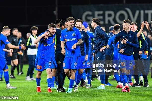 Players of FCSB are celebrating during the Romania Superliga Play-Off match between CFR 1907 Cluj and FCSB at Dr. Constantin Radulescu Stadium in...