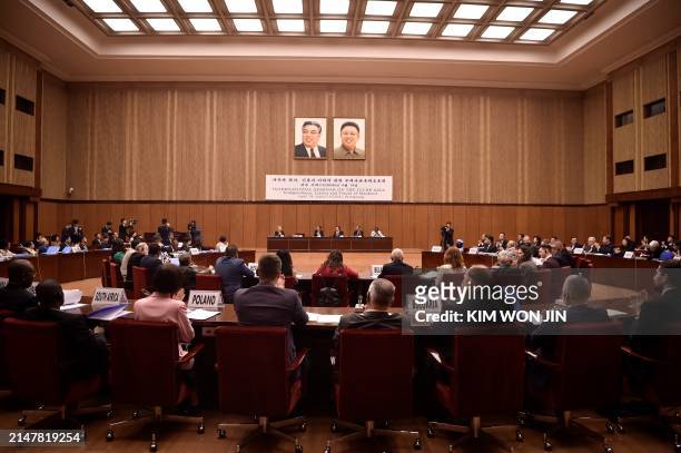 In this photo taken on April 14 Juche idea representatives from various countries attend a seminar on the Juche Idea "Independence, Justice and...