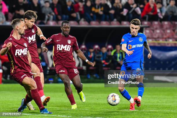 Octavian Popescu and Kader Keita are in action during the Romania Superliga Play Off between CFR 1907 Cluj and FCSB at Dr. Constantin Radulescu...