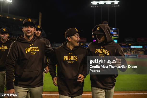 Yuki Matsui of the San Diego Padres celebrates with his teammates after defeating the Los Angeles Dodgers at Dodger Stadium on April 14, 2024 in Los...