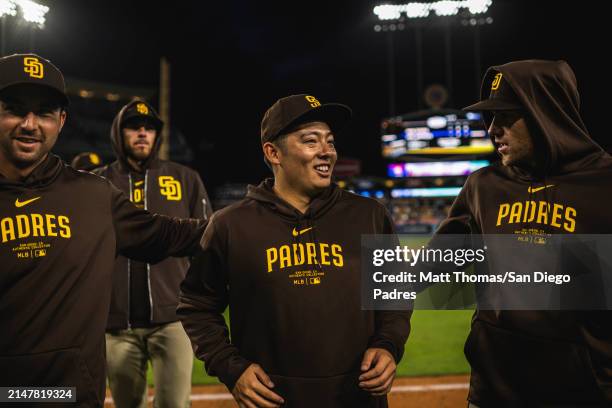 Yuki Matsui of the San Diego Padres celebrates with his teammates after defeating the Los Angeles Dodgers at Dodger Stadium on April 14, 2024 in Los...