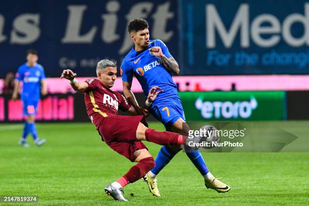 Florinel Coman and Cristian Manea are in action during the Romania Superliga Play-Off between CFR 1907 Cluj and FCSB at Dr. Constantin Radulescu...