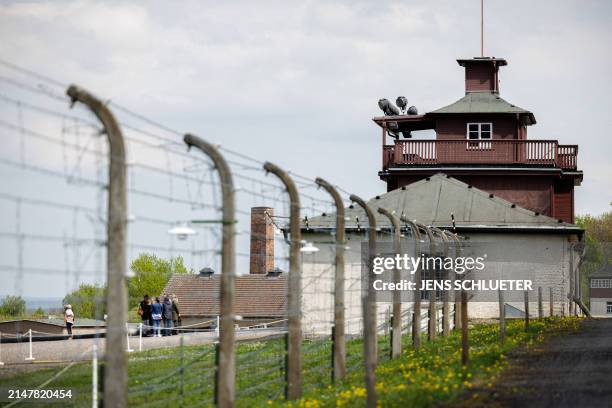 Barbed wire fence encloses the memorial site of the former Nazi concentration camp Buchenwald, pictured prior to the commemoration ceremony to mark...