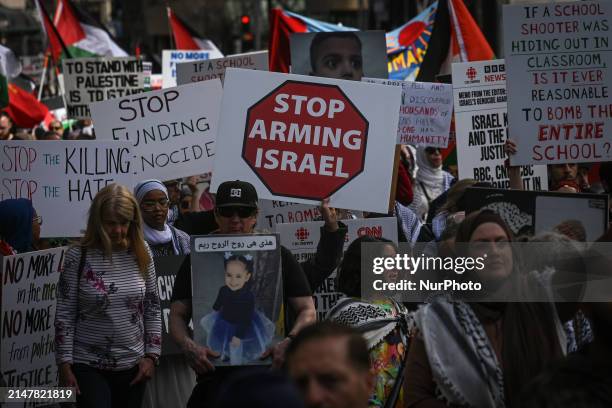 Members of the Palestinian diaspora supported by local activists, during the 'Stop Genocide Now' rally, marching through downtown Edmonton, on April...
