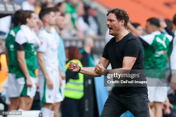 Head coach Edin Terzic of Borussia Dortmund celebrates the away win after the final whistle during the Bundesliga match between Borussia...