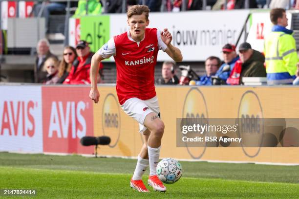 David Moller Wolfe runs with the ball during the Dutch Eredivisie match between AZ Alkmaar and RKC Waalwijk at AFAS Stadion on April 13, 2024 in...