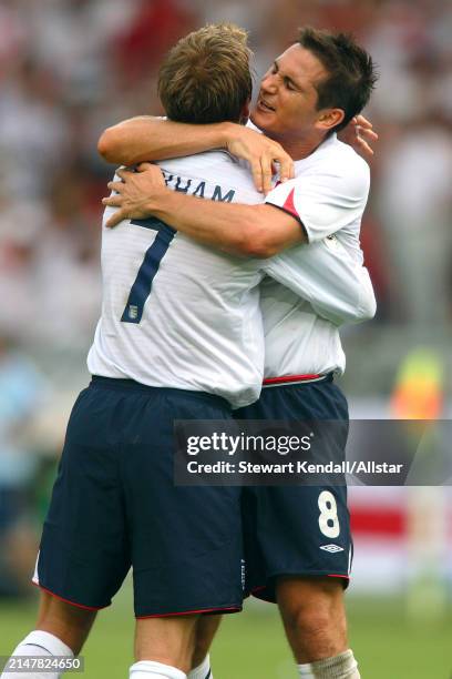 June 25: David Beckham of England and Frank Lampard of England celebrate after the FIFA World Cup Finals 2006 Round Of 16 match between England and...