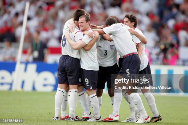 June 25: John Terry, Wayne Rooney, Ashley Cole, Owen Hargreaves and Rio Ferdinand of England celebrate after winning the FIFA World Cup Finals 2006...