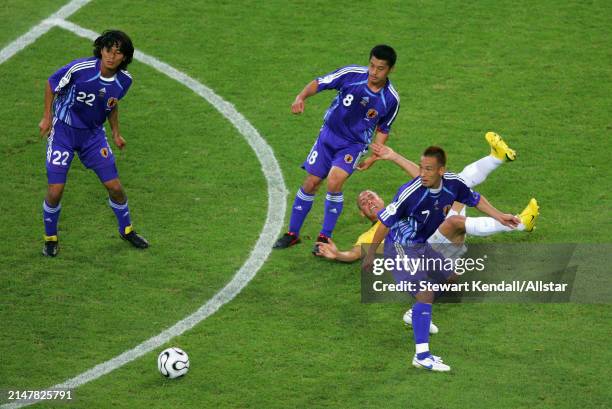 June 22: Yuji Nakazawa, Mitsuo Ogasawara and Koji Nakata of Japan challenge Ronaldo of Brazil during the FIFA World Cup Finals 2006 Group F match...