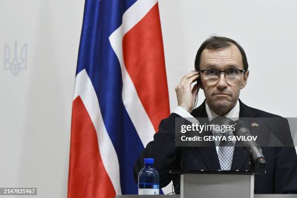 Norway's Foreign Minister Espen Barth Eide attends a joint press conference with his Ukrainian counterpart following their talks in Kyiv on April 15...