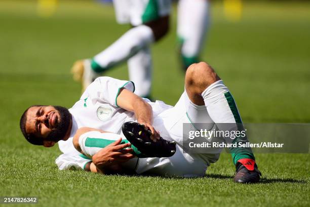 June 23: Abdulaziz Khathran of Saudi Arabia is injured during the FIFA World Cup Finals 2006 Group H match between Saudi Arabia and Spain at...