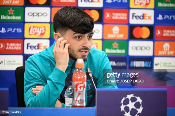 Barcelona's Spanish midfielder Pedri gives a press conference on the eve of their UEFA Champions League quarter-final second leg football match...