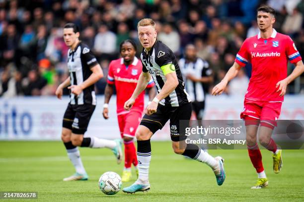 Brian De Keersmaecker of Heracles Almelo dribbles with the ball during the Dutch Eredivisie match between Heracles Almelo and sc Heerenveen at the...
