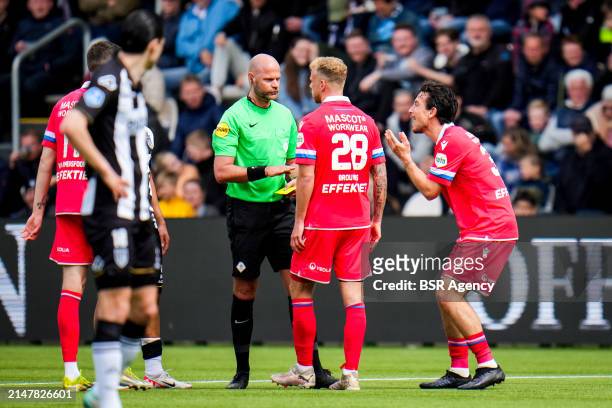Thom Haye of sc Heerenveen reacts after receiving a yellow card from referee Rob Dieperink during the Dutch Eredivisie match between Heracles Almelo...