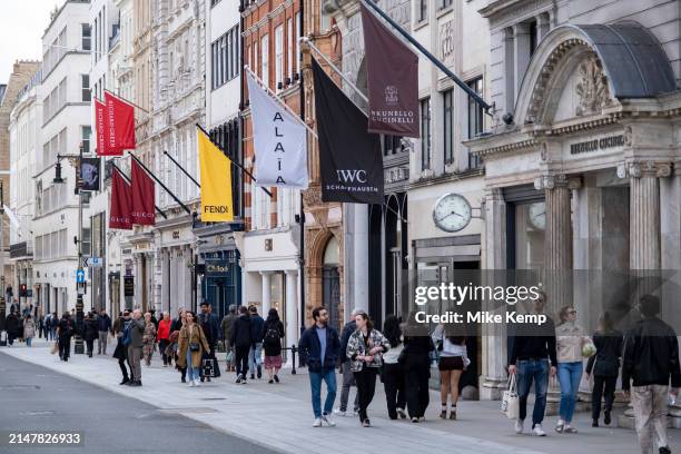 Art gallery and fashion retailers flags on Bond Street on 7th April 2024 in London, United Kingdom. Bond Street is one of the principal streets in...