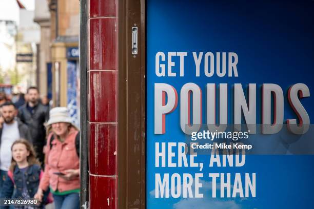 Money Exchange shop predominantly for tourists on Oxford Street on 7th April 2024 in London, United Kingdom. These shops allow customers to change...