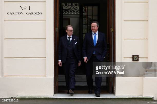 British Foreign Secretary David Cameron and Swedish Foreign Minister Tobias Billstrom walk after their meeting at Carlton Gardens on April 15, 2024...