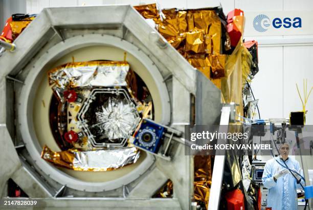 View of the The Hera spacecraft in a cleanroom of the European Space Research and Technology Center in Noordwijk on April 15, 2024. The ESA's...