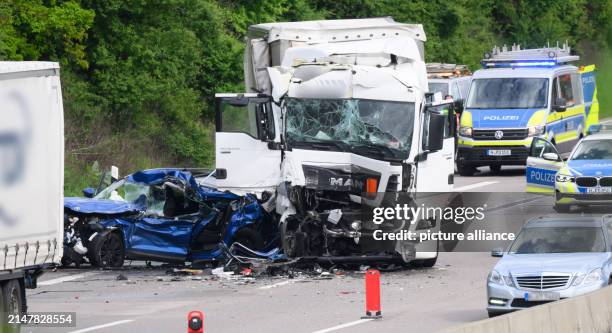 April 2024, Lower Saxony, Garbsen: A car and a truck are stuck on the A2 freeway after an accident. Several people were seriously injured in the...