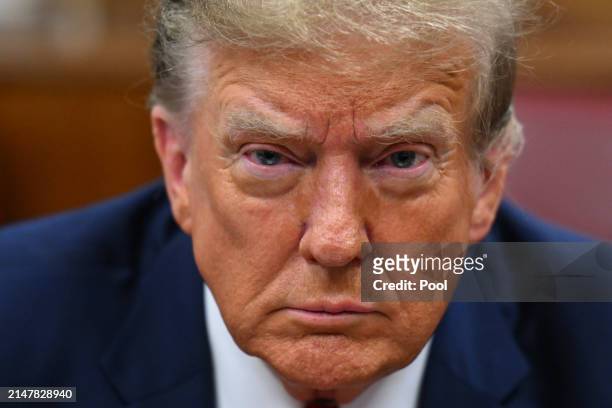 Former U.S. President Donald Trump attends the first day of his trial for allegedly covering up hush money payments at Manhattan Criminal Court on...