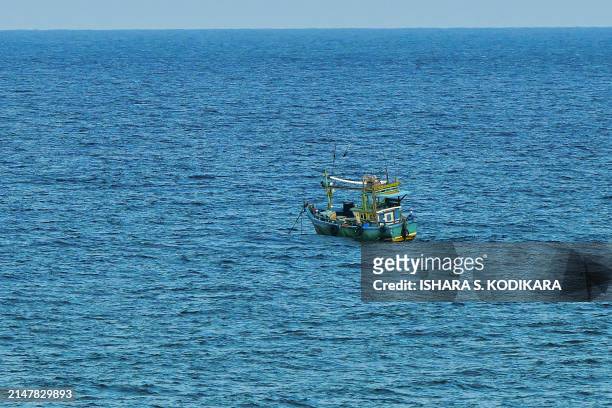 Fishing boats are anchored in the Sri Lankan coast near Trincomalee on April 15, 2024.