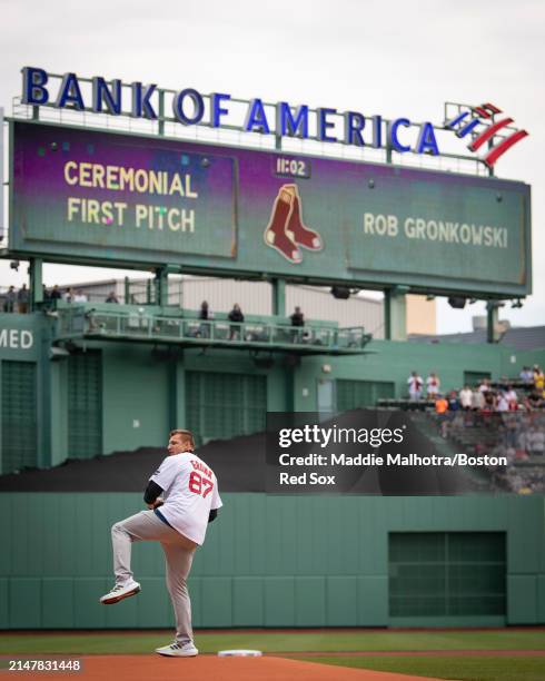 Ceremonial first pitch is thrown by Rob Gronkowski, former New England Patriots tight end and Grand Marshall for the 2024 Boston Marathon, during...