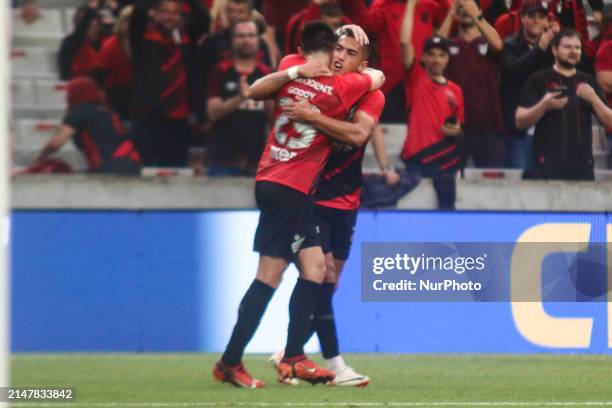 Athletico PR player Godoy is celebrating his goal in the match against Cuiaba for the Brazilian League Serie A Round 1 at Ligga Arena Stadium in...