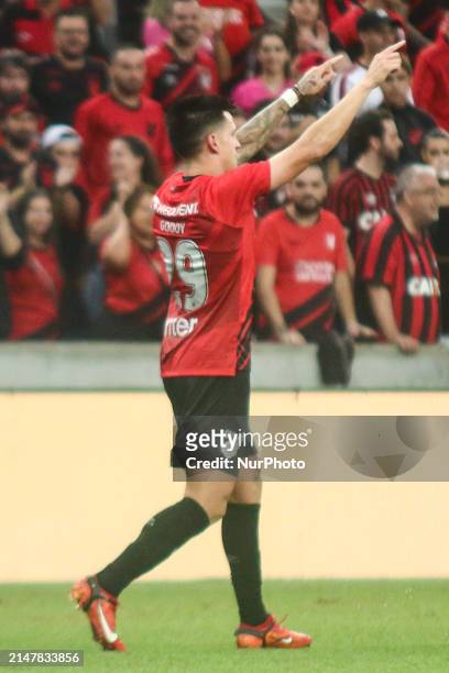 Athletico PR player Godoy is celebrating his goal in the match against Cuiaba for the Brazilian League Serie A Round 1 at Ligga Arena Stadium in...