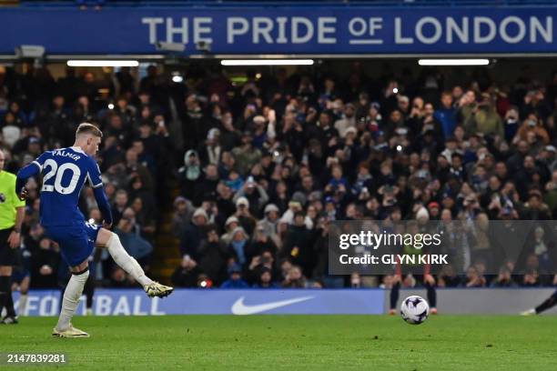 Chelsea's English midfielder Cole Palmer scores his fourth goal, chelsea's fifth from the penalty spot during the English Premier League football...