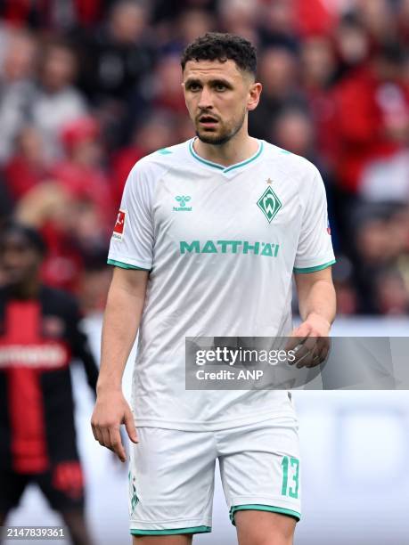 Milos Veljkovic of SV Werder Bremen during the Bundesliga match between Bayer 04 Leverkusen and Werder Bremen at the Bay Arena on April 14, 2024 in...