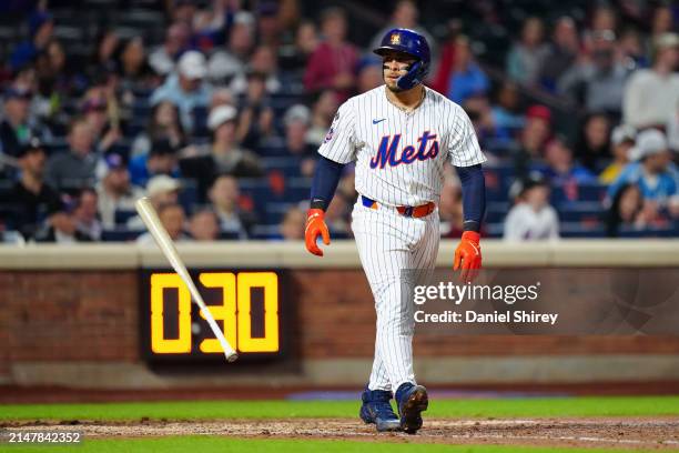 Francisco Alvarez of the New York Mets reacts after walking in the sixth inning of the game between the Pittsburgh Pirates and the New York Mets at...