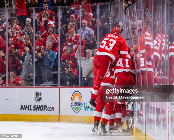 Lucas Raymond of the Detroit Red Wings scores the game winning gaol on Sam Montembeault of the Montreal Canadiens during the O.T. Period at Little...